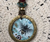 bee-ing galactic enameled necklace pendant